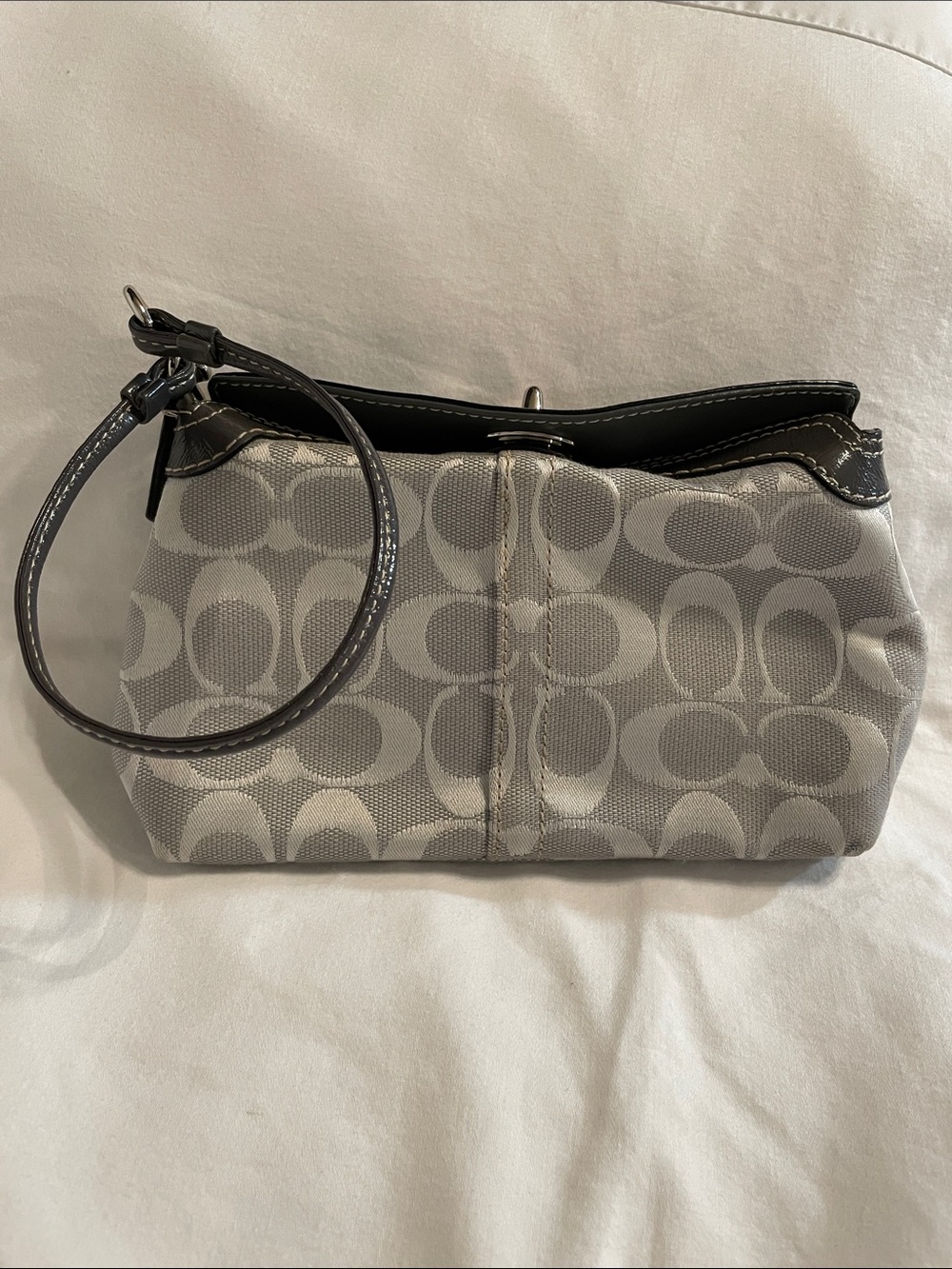 Coach Silver Signature Wristlet with Dark Grey Trim